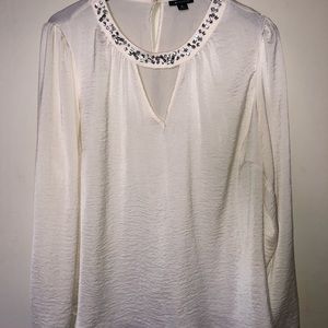 Cute jeweled blouse.